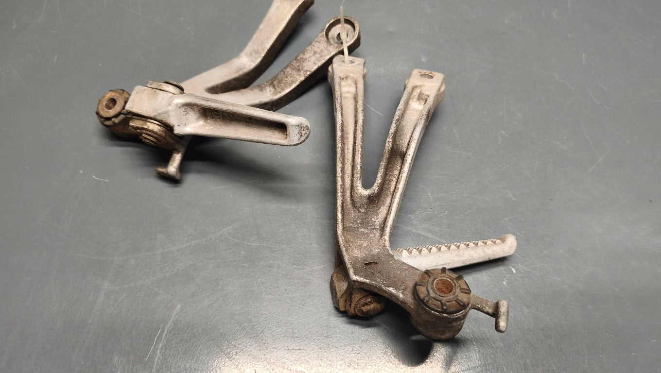 Honda genuine used NSR250 MC28 Passenger Foot Pegs exhaust hangers