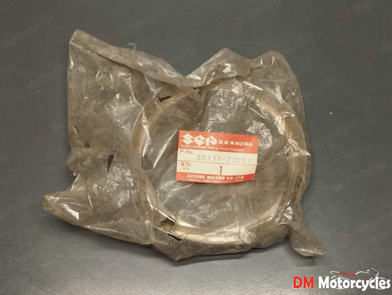 Suzuki genuine nos headlight rim pn 35111-22021