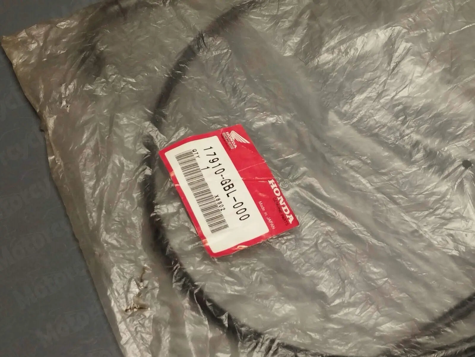 Honda genuine new Dio ZX 50 throttle cable pn 17910-gbl-000