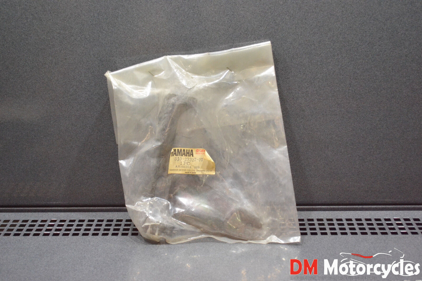 Yamaha genuine nos dt 50mx dt 50 lh headlight bracket pn 5j0-23327-01