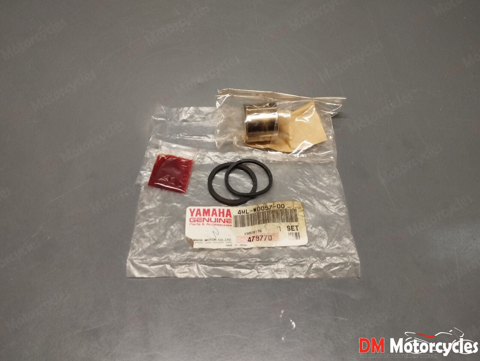 Yamaha genuine new TY 250 YZ 125 250 brake caliper piston kit pn 4ml-w0057-00