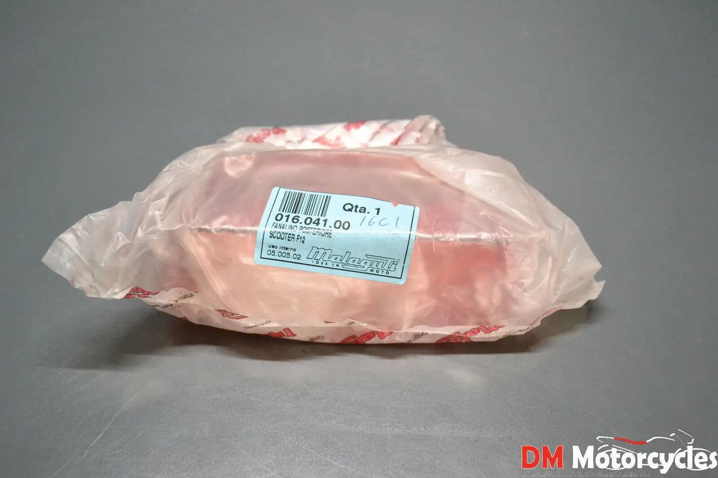 Malaguti genuine new madison f12 rear brake light lens kit pn 01604100