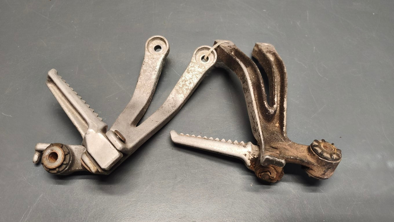 Honda genuine used NSR250 MC28 Passenger Foot Pegs exhaust hangers