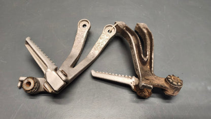 Honda genuine used NSR250 MC28 Passenger Foot Pegs exhaust hangers